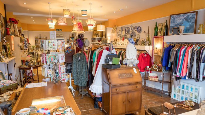 A overview landscape photo of the inside of Rowcroft Hospice Babbacombe charity shop.