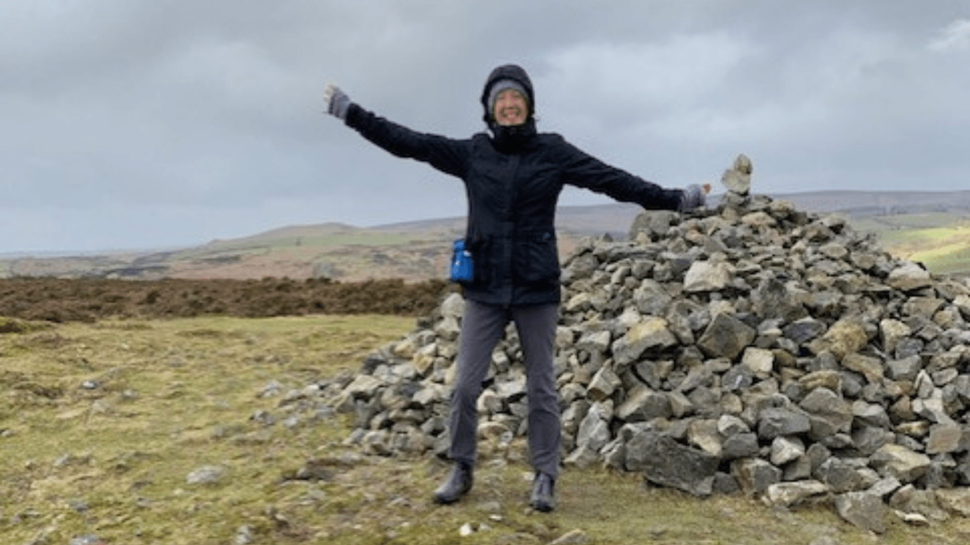 Gill Horne poses on the moors during her 1000 mile walk for Rowcroft.
