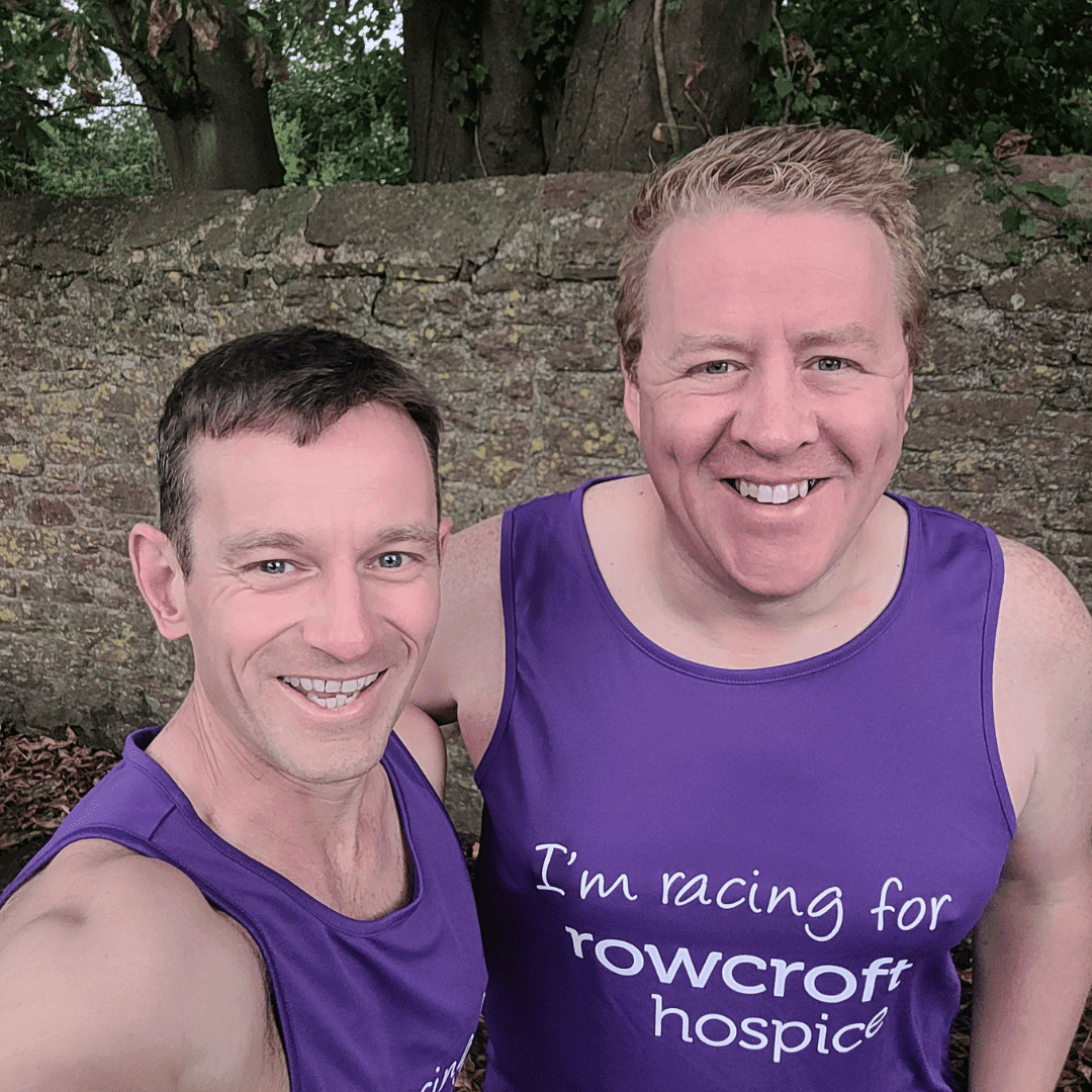 Two men in their Rowcroft Hospice fundraising t-shirts.