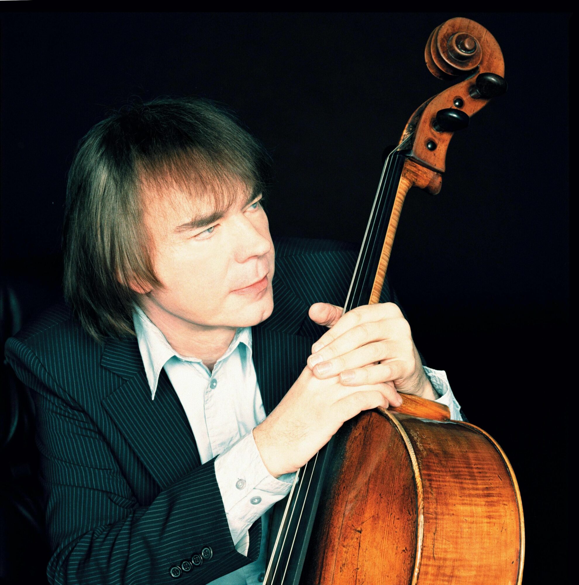 Julian Lloyd Webber poses with is cello