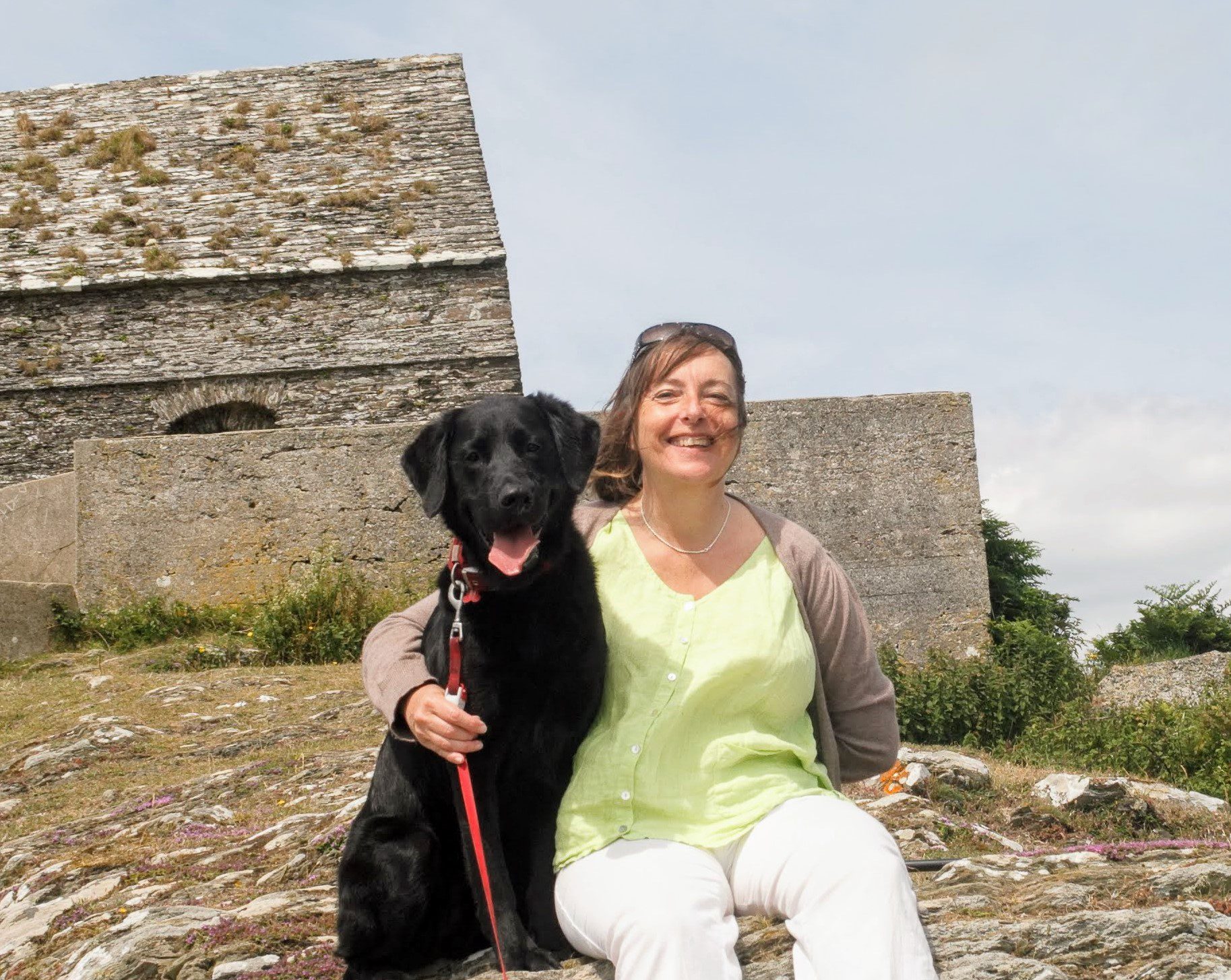 Nickie smiling with her dog