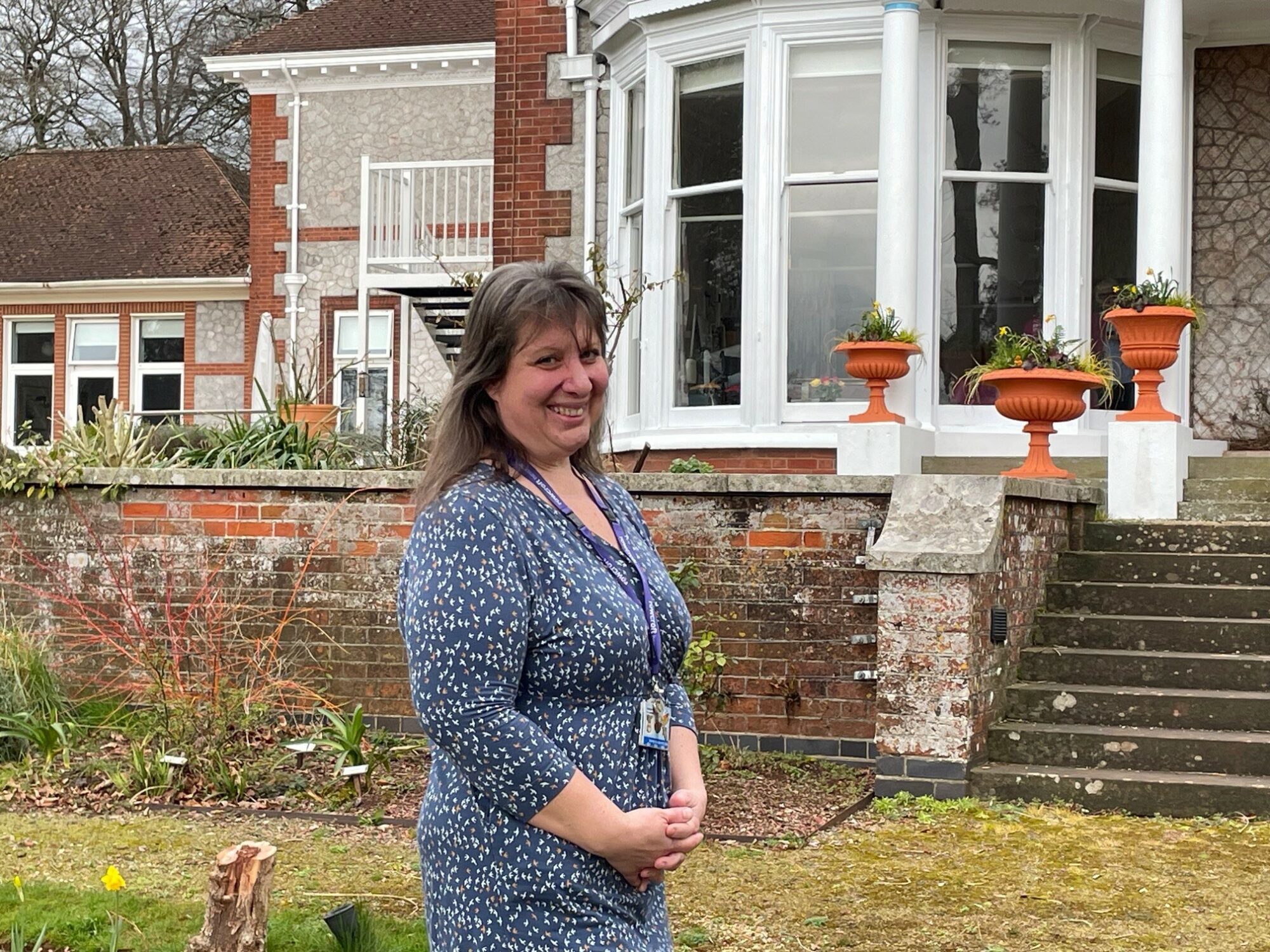 Rowcroft Social Worker Nicola Monks stands outside the hospice building