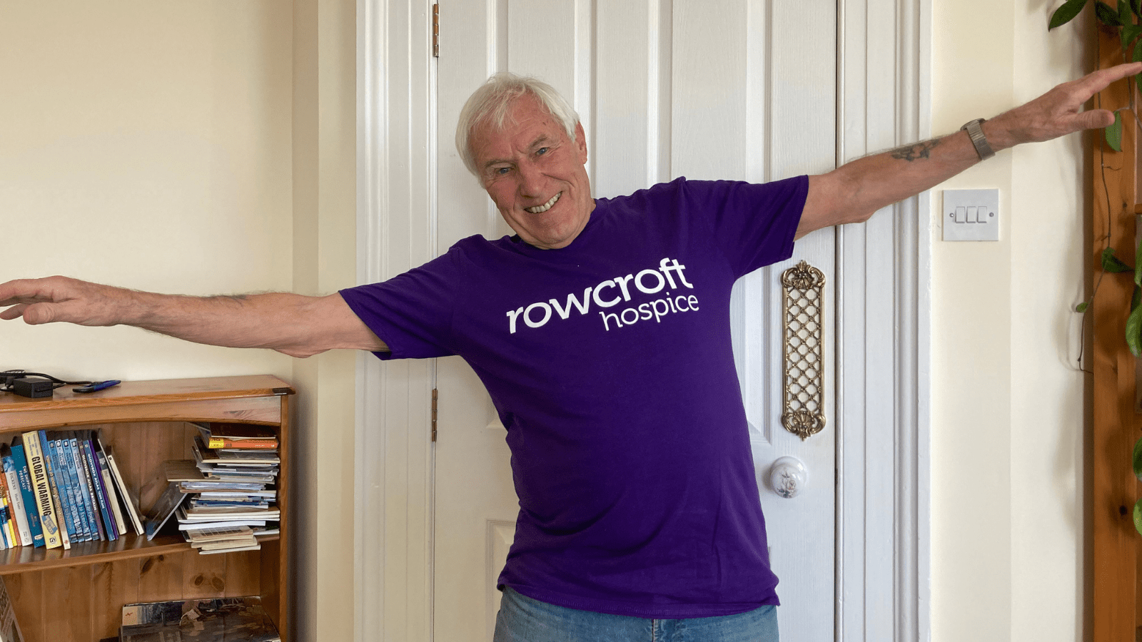 Norman Bellamy poses in a Rowcroft t-shirt.