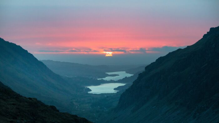 A landscape picture of the view from Mount Snowdon at sunrise.