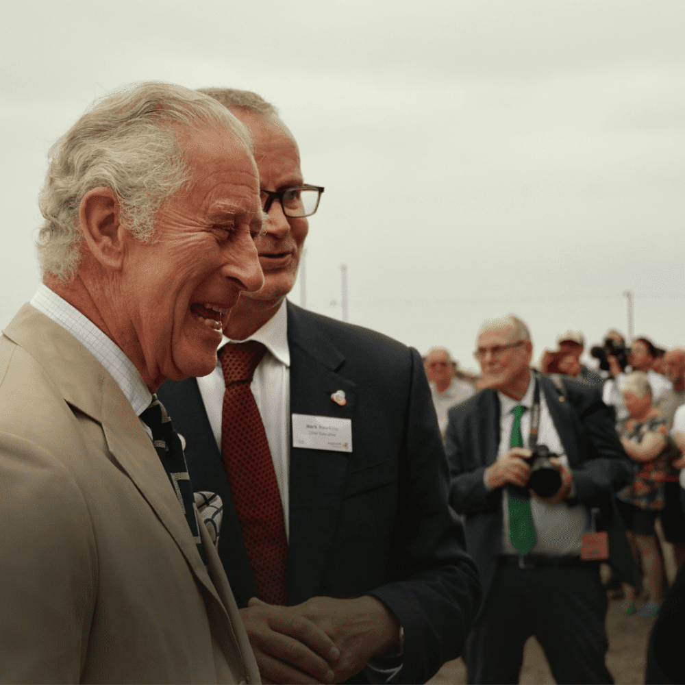 The Prince of Wales enjoys a laugh with the Rowcroft team