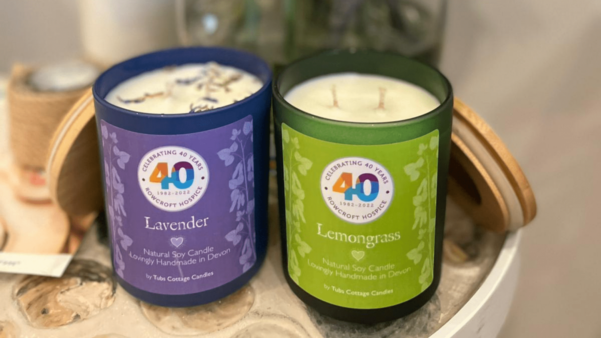 The lemongrass and lavender 40th anniversary candles are on display.