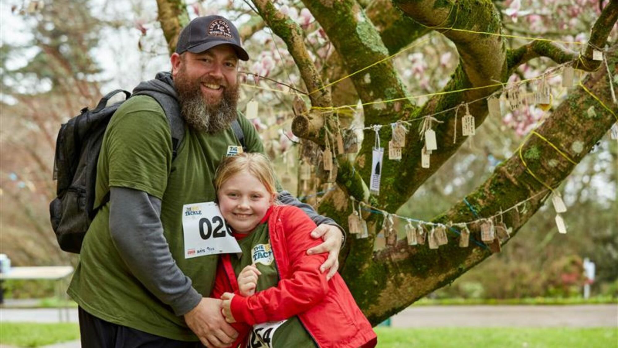 The Big Tackle participants stood in front of the memory tree.