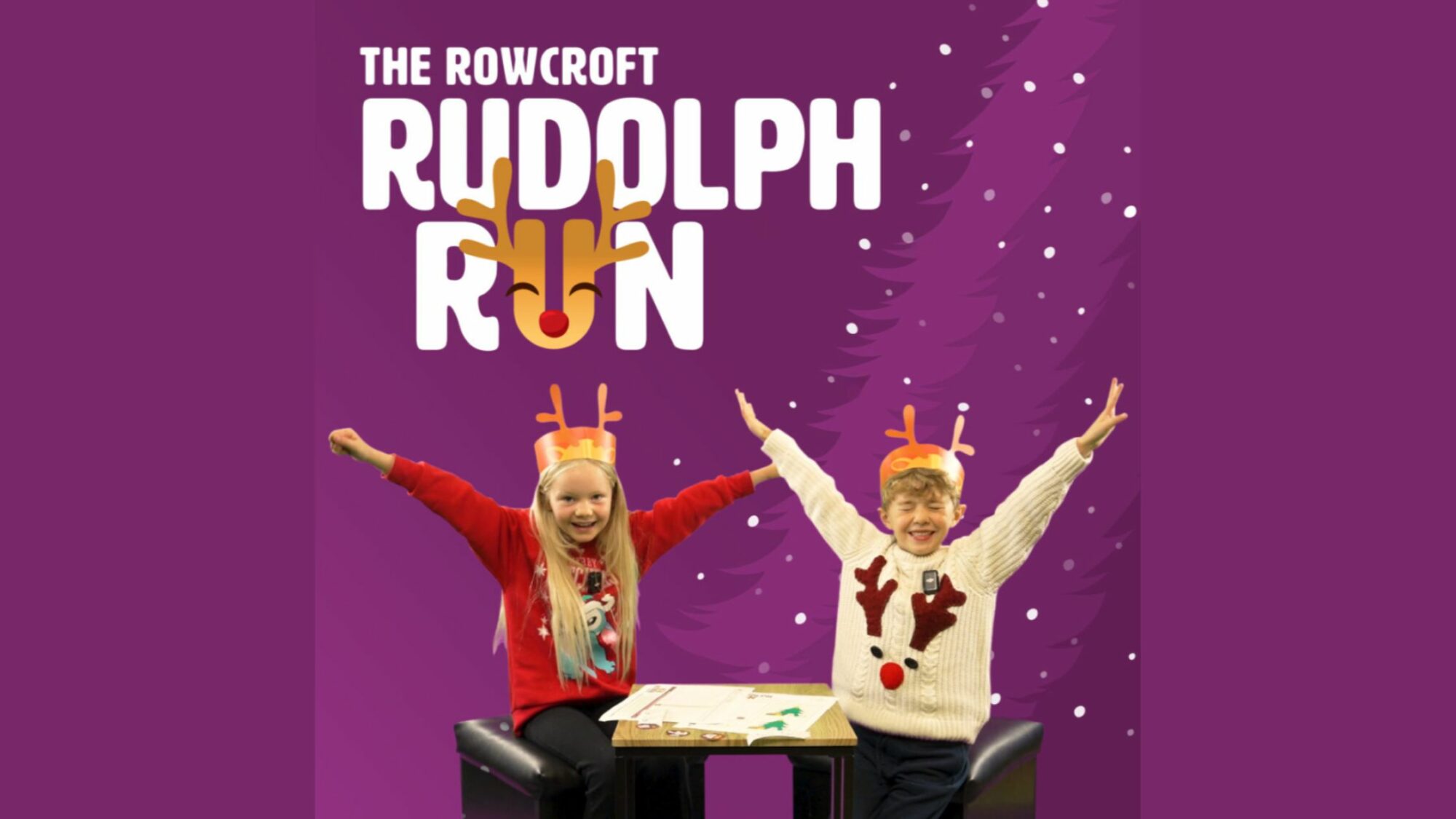 Two children in reindeer antlers, excited to participate in Rowcroft's Rudolph Run